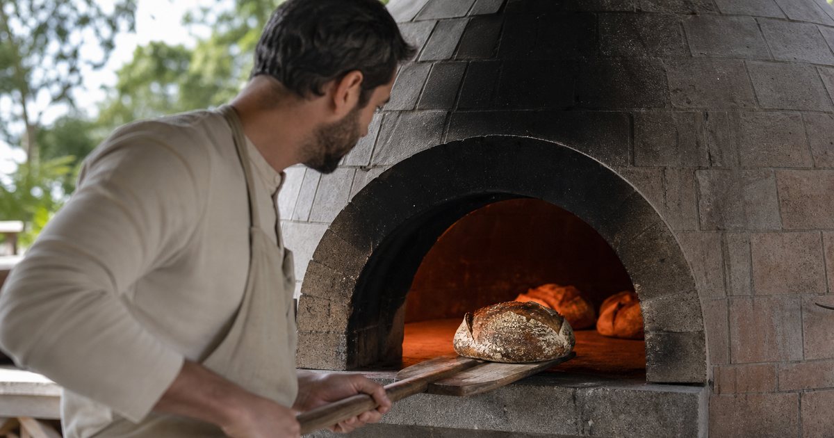 What is the best way to bake bread with retained oven heat?